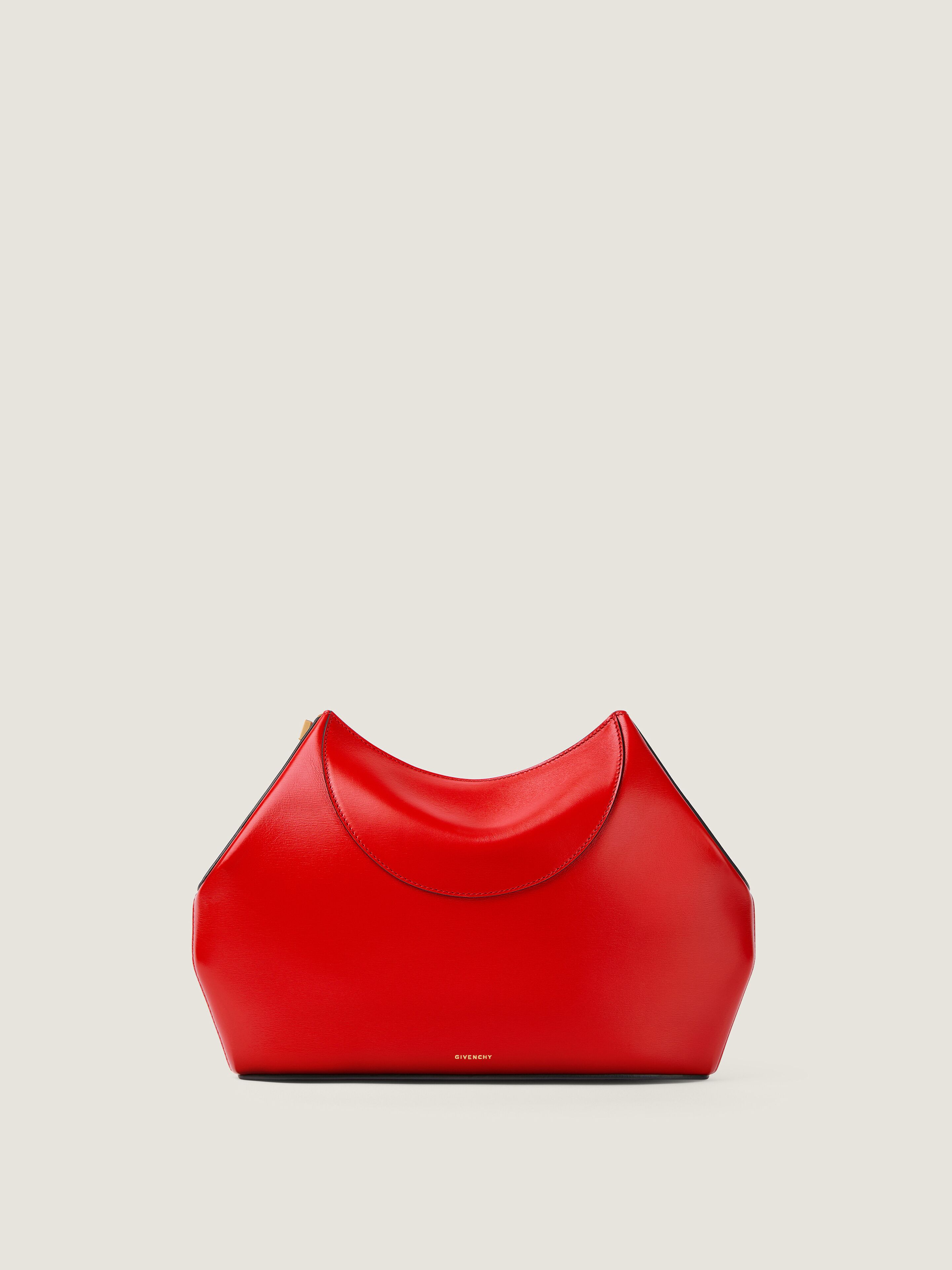 Facet clutch in leather